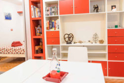 Library and table - Pigneto65 - Your home in Rome